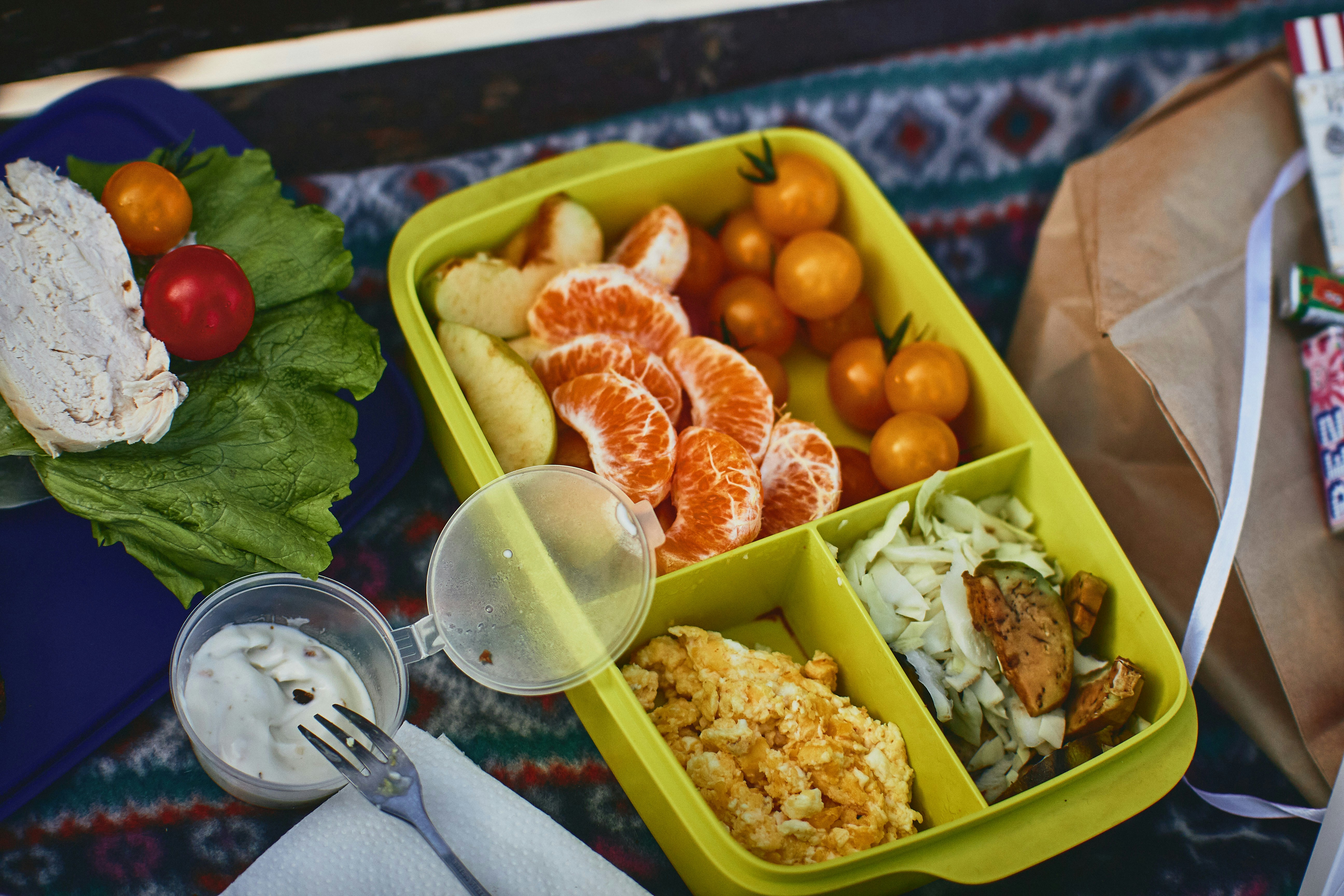 Organized school lunch box with healthy food for kids